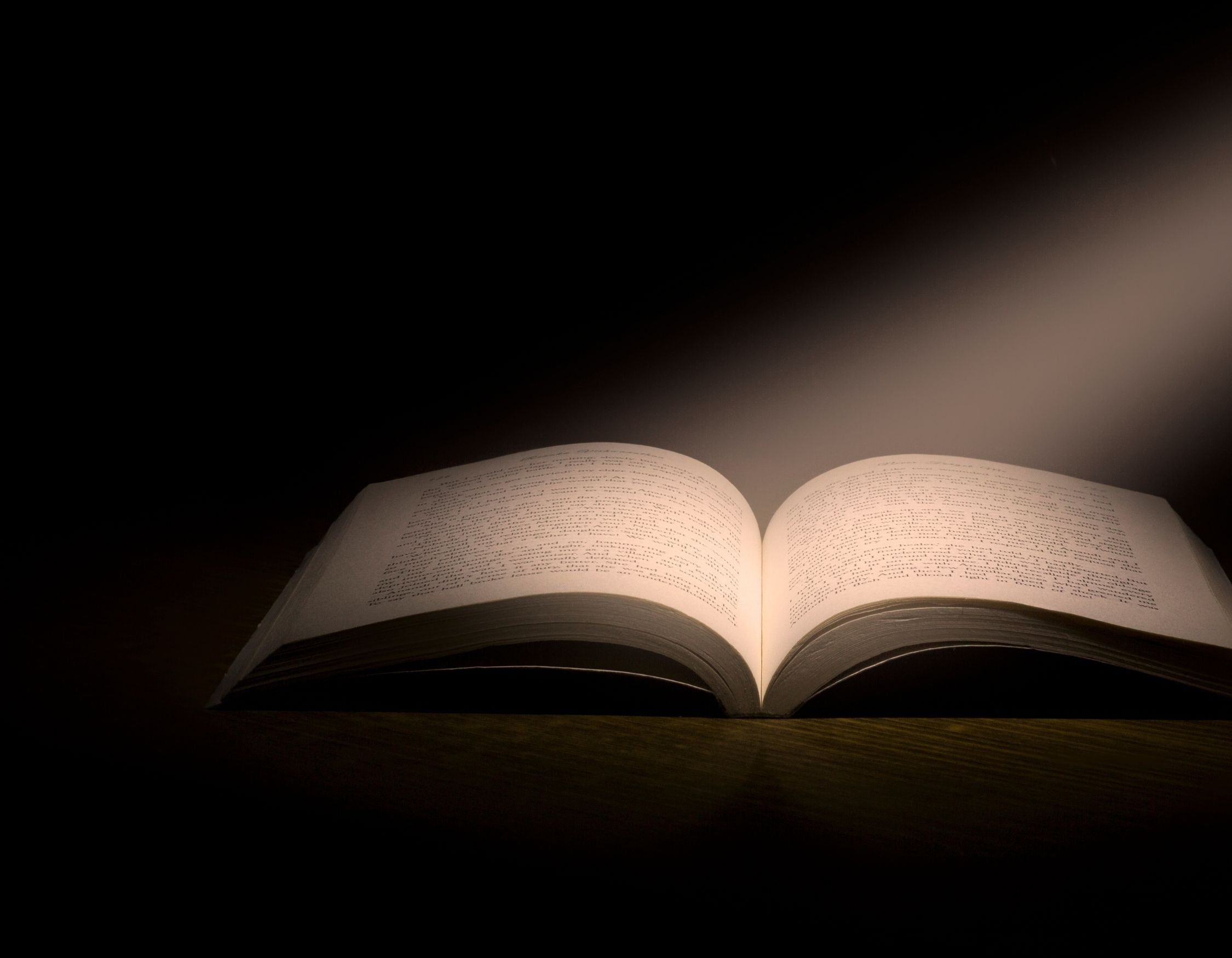 Open book symbolizing storytelling and myth – Pelorus Yachting 2026 cinematic Odyssey yacht charter experience in the Mediterranean.